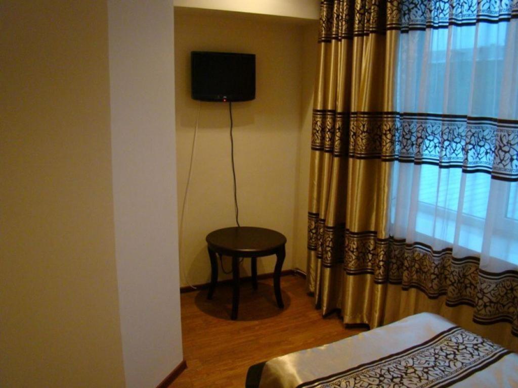 Kausar Hotel Alma-Ata Kamer foto
